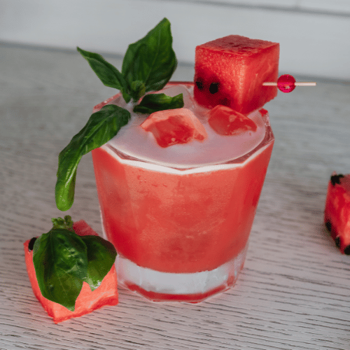 CBD watermelon cocktail with mint leaves decor.